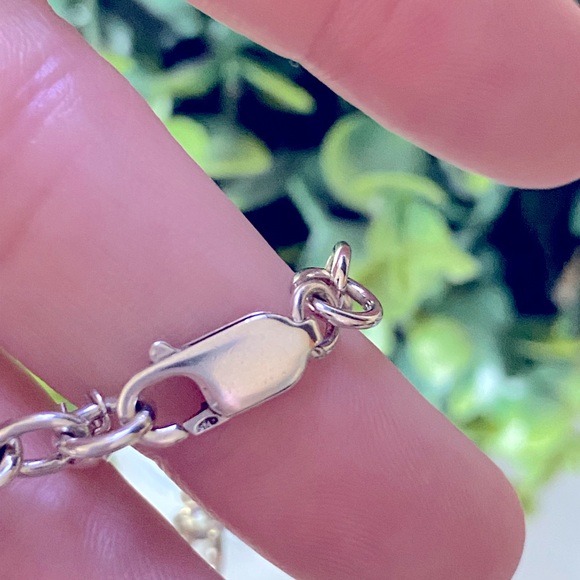 Multi-language sterling silver thick chunky charm love bracelet. Measures 7”
